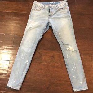 Light denim jeans ripped/paint splatter effect